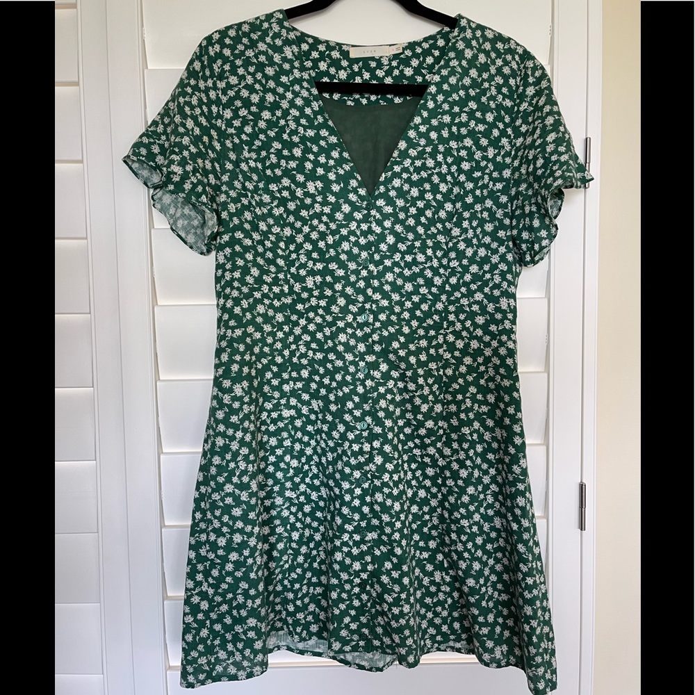 Mini dress. Green with white flowers.